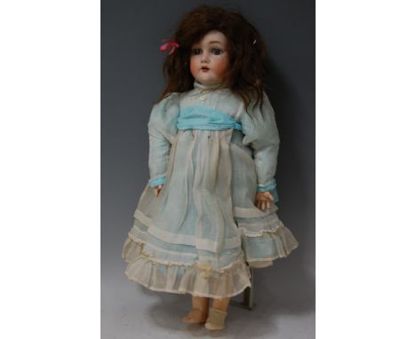 A Kammer &amp; Reinhardt for Simon &amp; Halbig bisque head doll, having fixed blue eyes, open mouth with three top teeth sho