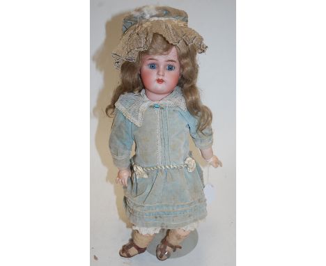 A Kammer & Reinhardt for Simon & Halbig bisque head doll, having rolling blue eyes and open mouth with four top teeth showing