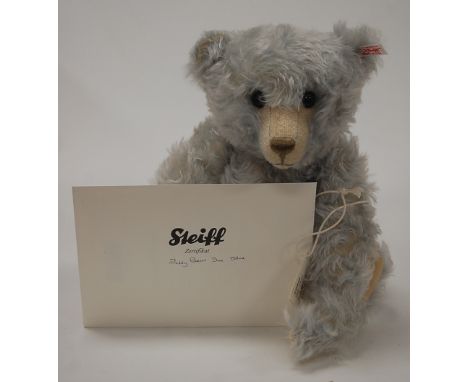 A modern Steiff teddy-bear 'Ice', in light blue mohair, with button in the ear and growler, having jointed limbs, limited edi