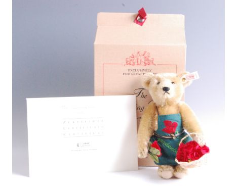 A modern Steiff The Gardening Bear, in blonde mohair with button to ear and white tag no. 654824, limited edition no. 00765/4