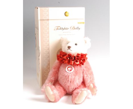 A modern Steiff Teddy Bear Dolly, in dusty pink and white mohair with silk ruff, with button and white tag to ear no. 037542,