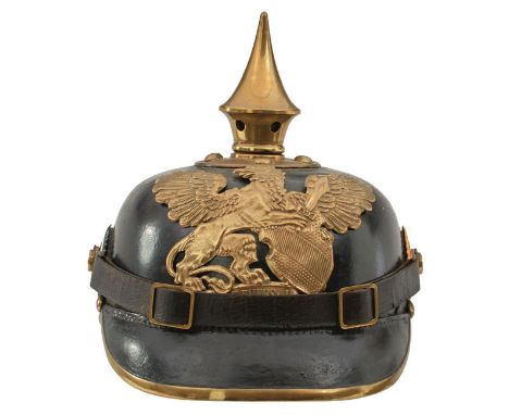 AN IMPERIAL GERMAN BADEN OTHER RANKS PICKELHAUBE, the black leather skull with brass trim and mounts, to include spike finial