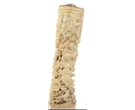 A 19TH CENTURY THAI FINELY CARVED BONE SWORD HANDLE, 15.5cm over all length and deeply carved and pierced with godly figures 