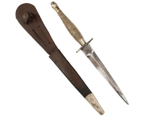 A FIRST PATTERN FAIRBAIRN SYKES COMMANDO KNIFE OR DAGGER, 17cm flattened diamond section blade etched to either side THE F-S 