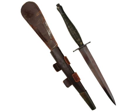 A FAIRBAIRN SYKES SECOND PATTERN BEADED AND RIBBED COMMANDO KNIFE, 17.cm flattened diamond section blued blade, blackened gri