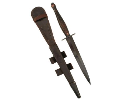 A FAIRBAIRN SYKES SECOND PATTERN BEADED AND RIBBED COMMANDO KNIFE, 17.5cm flattened diamond section blued blade, the crossgua