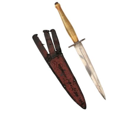 A SECOND PATTERN FAIRBAIRN SYKES B2 COMMANDO KNIFE OR DAGGER, 17cm flattened diamond section blade, regulation hilt, the guar