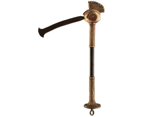 AN AFRICAN NIGERIAN CEREMONIAL PARADE AXE, early 20th Century, iron and brass, the blade emanating as a tongue from the brass