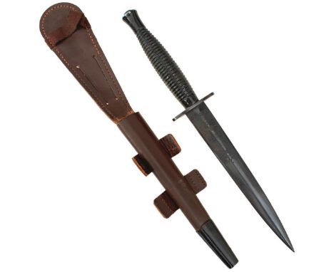 A GOOD FAIRBAIRN SYKES THIRD PATTERN COMMANDO KNIFE BY WILKINSON, 17.5cm flattened diamond section blued blade etched with a 