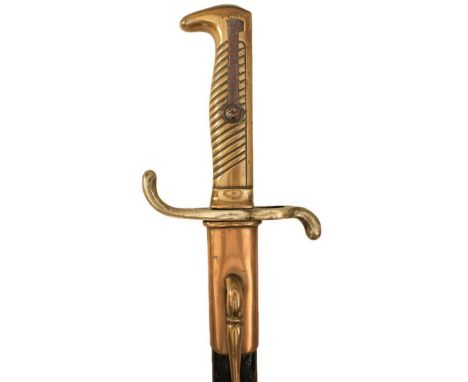 AN 1871 PATTERN GERMAN DRESS BAYONET, contained in its brass mounted leather scabbard.