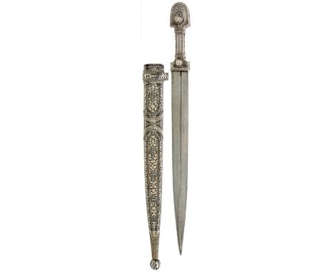 A CAUCASIAN SILVER NIELLO KINDJAL, 32.5cm fullered blade, characteristic hilt chiselled with foliage within beaded borders, f