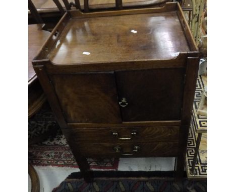 A Georgian mahogany night table, the tray type top above two cupboard doors and two dummy drawers