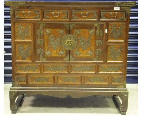 A Korean elm cabinet chest with brass decoration, a mahogany single drawer side table on square legs, and a gilt table lamp