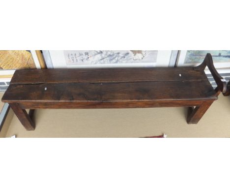A French farmhouse inglenook bench in elm