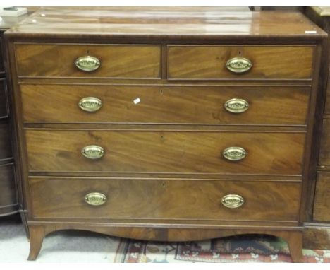 A Regency mahogany chest, the crossbanded top over two short and three long graduated drawers, to splayed bracket feet