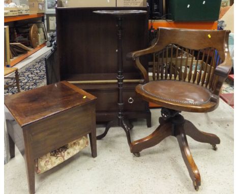 A 19th Century mahogany commode stool, a stick back office chair, a mahogany open bookcase, and a mahogany tripod table