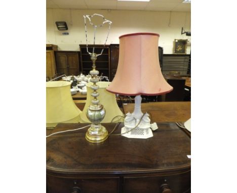 A Royal cream ware griffin decorated pottery table lamp and an onyx table lamp