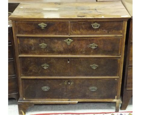 An 18th Century walnut chest of two short over three long graduated drawers, on bracket feet