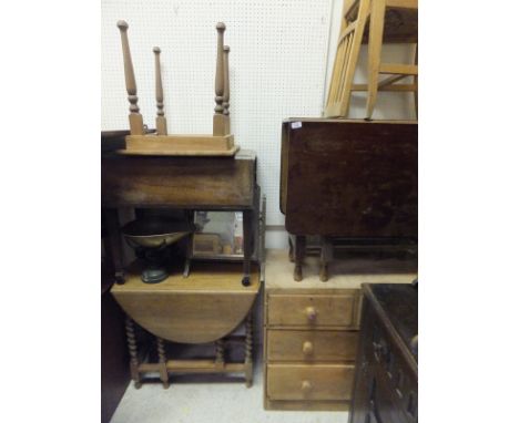 A pine chest of two short and two long drawers, an oak gateleg dining table, three tripod tables, etc