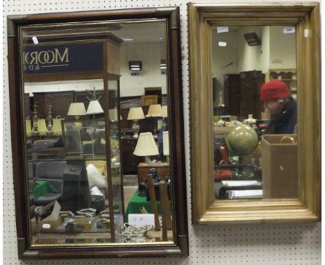A rectangular wall mirror in light gold coloured frame, together with another rectangular wall mirror with bevel edged plate 