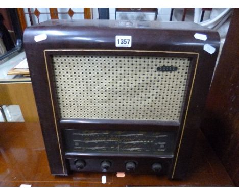 A 'BAIRD' RADIO RENTALS MODEL 64 BAKELITE RADIO