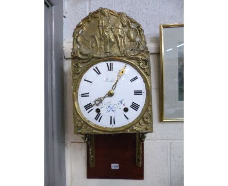 A FRENCH BRASS WALL CLOCK, with enamel dial marked 'Roder A Charny', (pendulum and two weights)