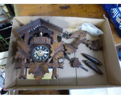 A MODERN CUCKOO CLOCK, with weights
