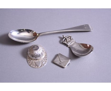 TWO ELIZABETH II SILVER CADDY SPOONS, one cast as a jockey's cap, maker HC, Sheffield 1997, the other maker R.E.S., London 19