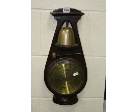 AN EARLY 20TH CENTURY CASED ANEROID BAROMETER, fitted with a brass dinner bell shaped gong, with striker