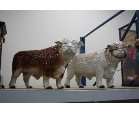 TWO MELBA WARE POTTERY BULLS, Hereford and Charolais (2)