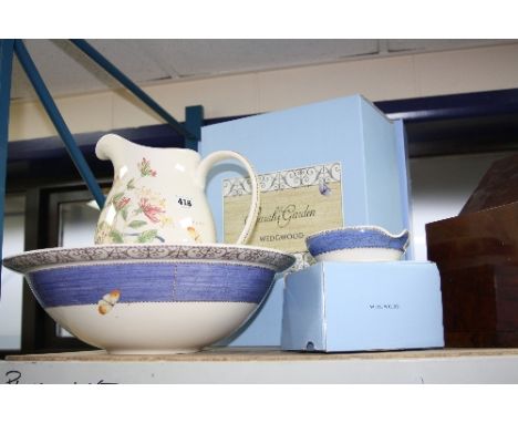 A BOXED WEDGWOOD SARAH'S GARDEN wash jug and bowl and a matching boxed lemon squeezer (2)