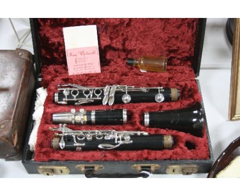 A CASED CAMBRIDGE PLASTIC AND PLATED CLARINET