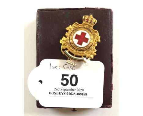 Bulgaria. Military Red Cross Honour cased badgeA fine gilt and enamel example with central red Geneva Cross; housed in its fi