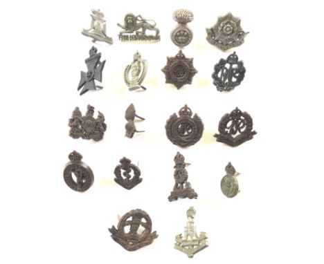 18 WW2 plastic economy cap badges.Wiltshire ... King’s Own ... R. Welch Fusiliers ... East Yorkshire ... KRRC ... RAC ... RAS