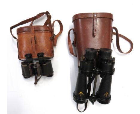 Two Pairs of RAF Used Binocularsconsisting pair of “AM” marked “6E/293”, 1943 dated binoculars by Watson.  Complete in leathe