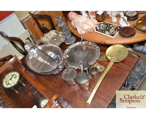 A quantity of various plated ware including two decorative serving dishes, commemorative salver, a spelter candlestick, brass