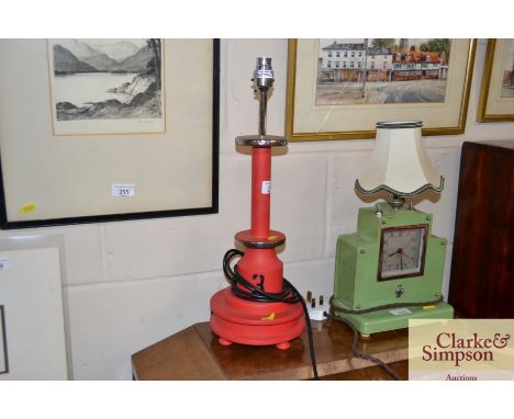 A decorative red table lamp