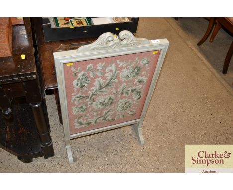An embroidered firescreen 