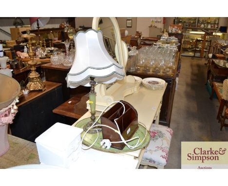 An oval tin tray, mahogany letter rack and a table lamp