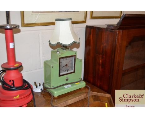 An Art Deco clock table lamp
