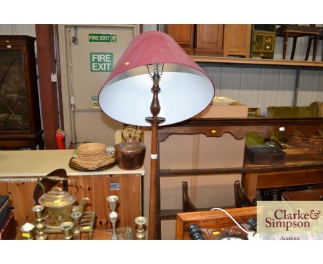 A standard lamp and shade
