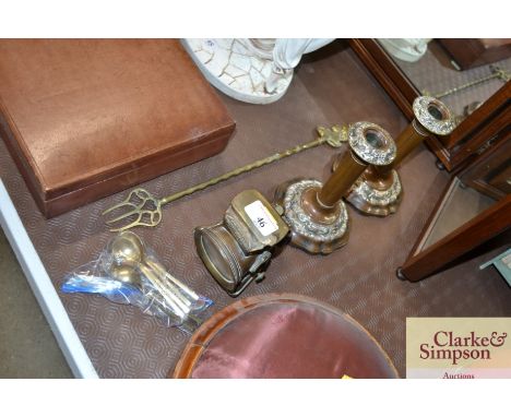 A Lucas silver "King of The Road" cycle lamp; a pair of copper and plated candlesticks; a brass toasting fork etc.