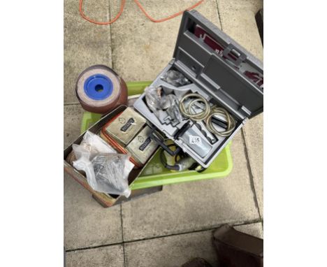 A large assortment of tools including drill, nails, vacuum pump etc