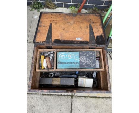 A large vintage wooden chest of assorted tools, spanner combination sets etc