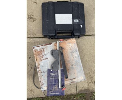 An Erbauer drill &amp; diamond wheel tile cutter