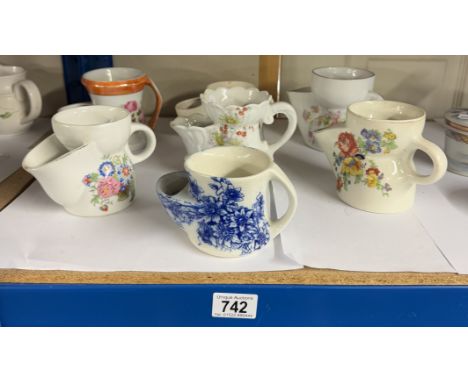 A selection of vintage ceramic shaving mugs