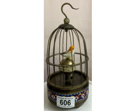 A brass & cloisonne enamel bird cage clockAppears to tick but bird doesn't move & alarm doesn't activate.