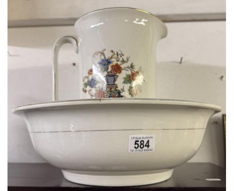 An Edwardian floral decorated wash basin &amp; jug