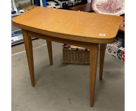 A 1950's oak fold over tea/card table