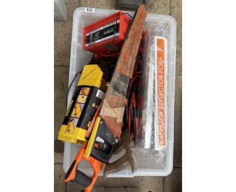 A very large assortment of tools including saw, battery charger, Stanley wood angle cutter